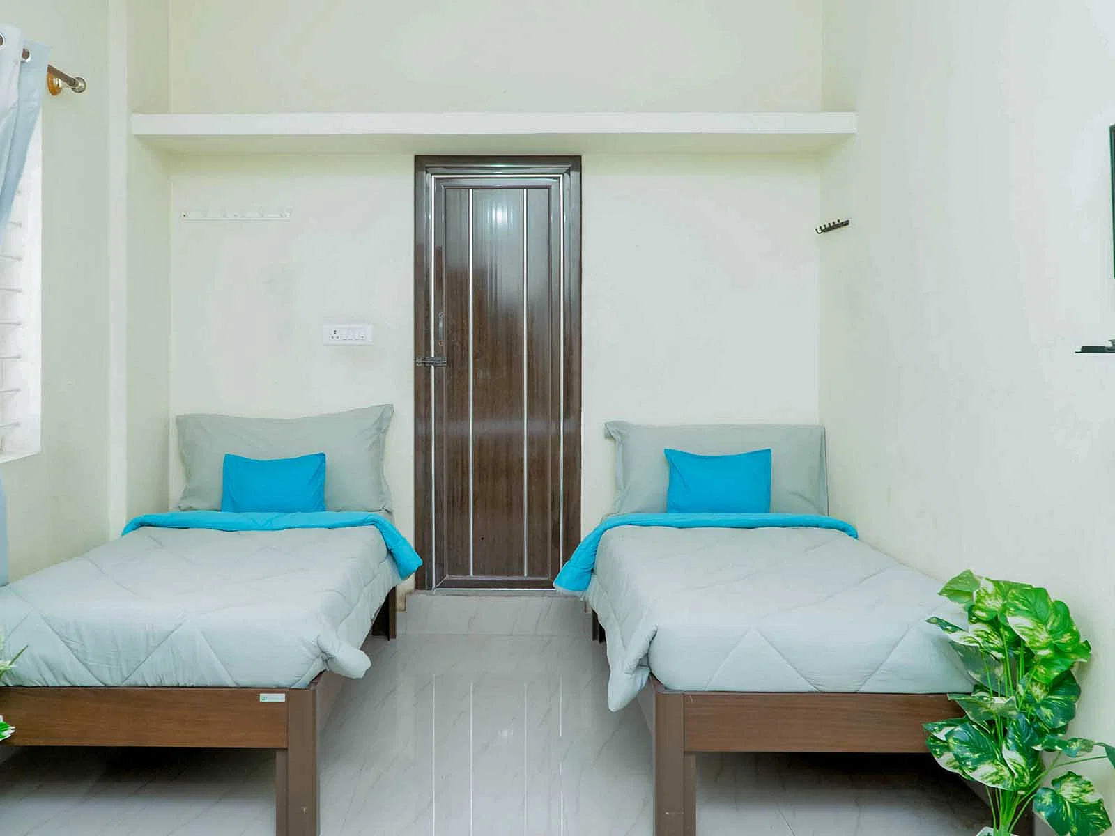 luxury PG accommodations with modern Wi-Fi, AC, and TV in Electronic City Phase 2-Bangalore-Zolo Carnations