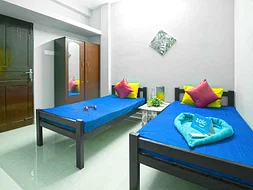 luxury PG accommodations with modern Wi-Fi, AC, and TV in Karapakkam-Chennai-Zolo Cruze