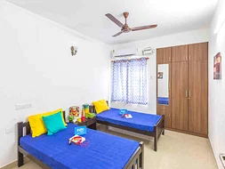 luxury PG accommodations with modern Wi-Fi, AC, and TV in Urapakkam-Chennai-Zolo Milano