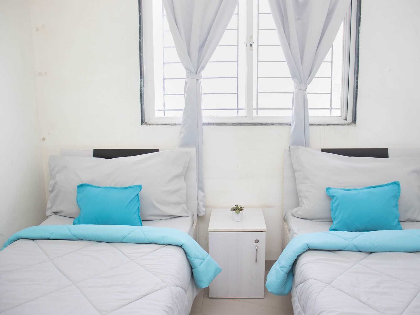 luxury pg rooms for working professionals boys and girls with private bathrooms in Pune-Zolo Aquascape