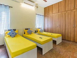 luxury PG accommodations with modern Wi-Fi, AC, and TV in Saravanampatti-Coimbatore-Zolo Upstream