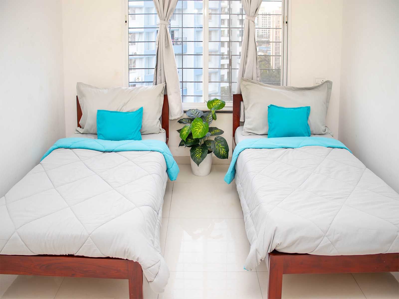 luxury pg rooms for working professionals unisex with private bathrooms in Pune-Zolo Snehangan