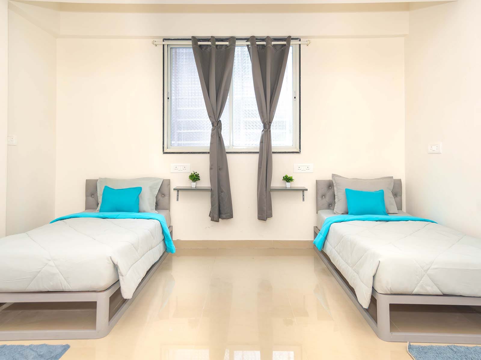 Affordable single rooms for students and working professionals in Kharadi-Pune-Zolo Zen Elite